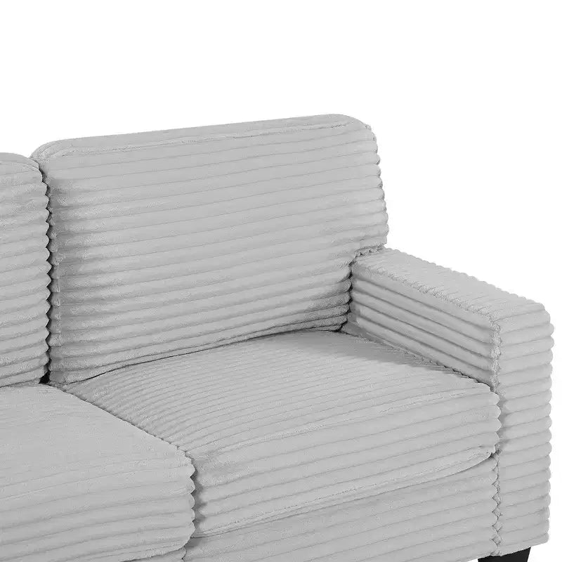Divano Sezionale Whisen in Velluto a Coste con Pouf Rimovibile e Tasche Laterali Contenitive