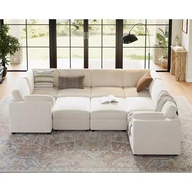 Divano sezionale modulare a L GustoWave, divano a 9 posti oversize con 2 pouf contenitori, divano letto moderno e confortevole in ciniglia con seduta profonda