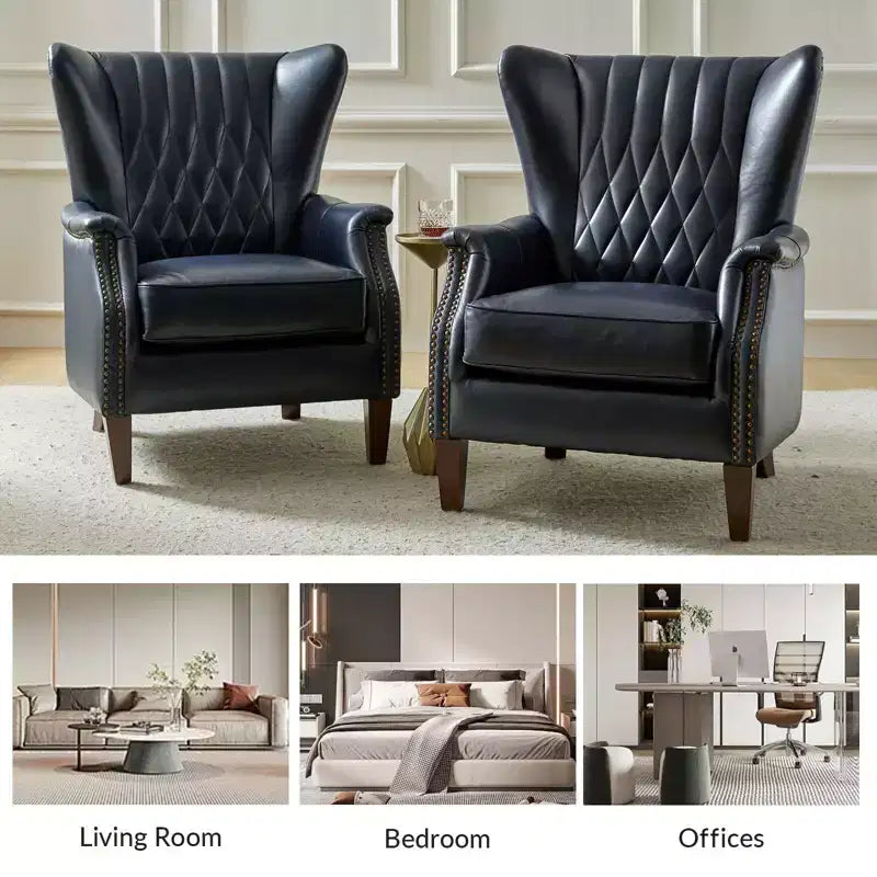 Poltrona a pozzetto in vera pelle con borchie decorative e gambe in legno massello, blu nautico