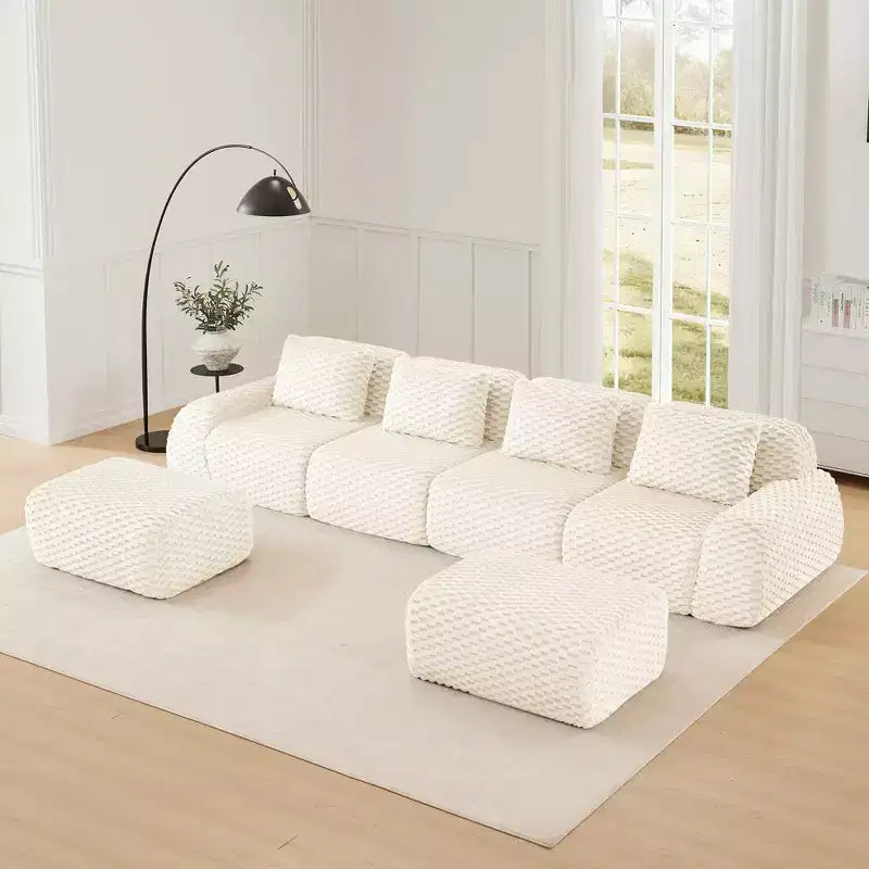 146 Divano modulare a U in flanella a 4 posti con pouf e fibbia, nessun assemblaggio richiesto, color crema