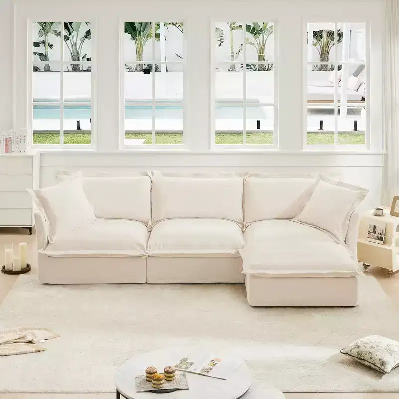 Comodo divano componibile a L, divano nuvola oversize con pouf convertibile per soggiorno