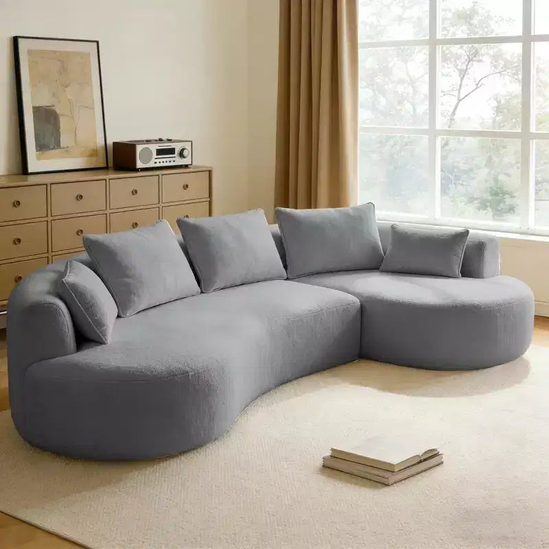 Divano componibile curvo Dyonery 122, comodo divano con chaise longue, divano moderno "nuvola" con seduta profonda, rivestimento in pile di agnello
