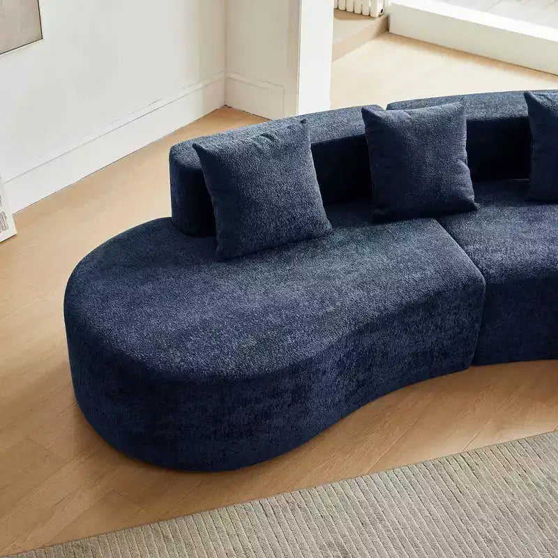 Divano modulare componibile a 5 posti curvo in velluto MAYEERTY con cuscini decorativi