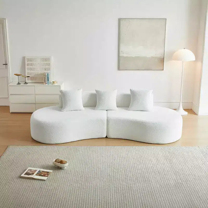Divano modulare componibile a 5 posti curvo in velluto MAYEERTY con cuscini decorativi