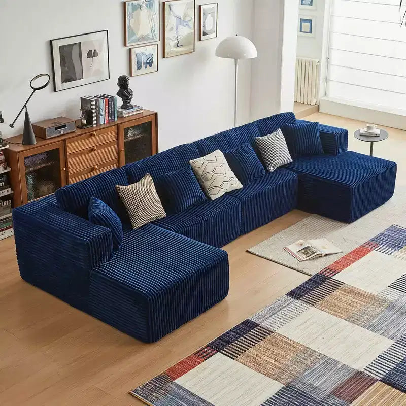 Divano componibile a U MAYEERTY in flanella blu, con schiuma ad alta densità e cuscini decorativi