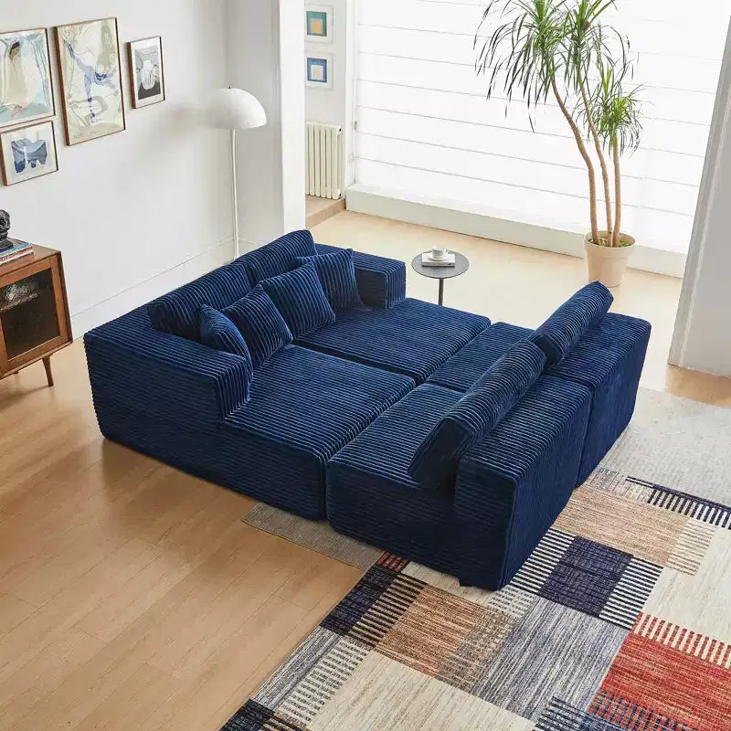 Divano componibile a U MAYEERTY in flanella blu, con schiuma ad alta densità e cuscini decorativi