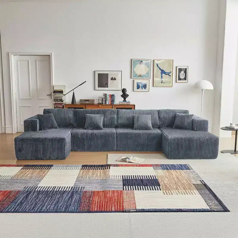 Divano componibile a U MAYEERTY in flanella blu, con schiuma ad alta densità e cuscini decorativi