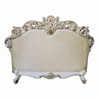 Traditional Carved Loveseat in Champagne Faux Leather with Nailhead Trim, 70 Inch