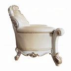 Traditional Carved Loveseat in Champagne Faux Leather with Nailhead Trim, 70 Inch