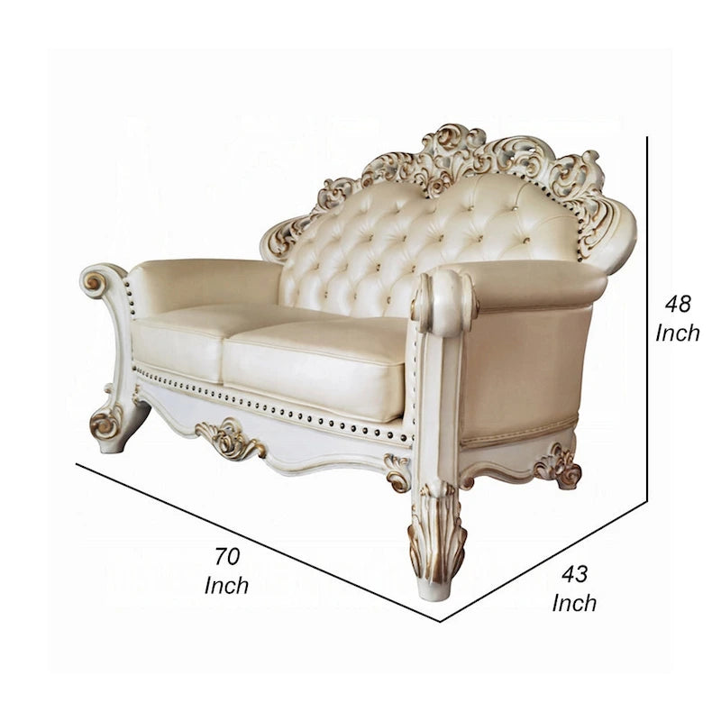 Traditional Carved Loveseat in Champagne Faux Leather with Nailhead Trim, 70 Inch